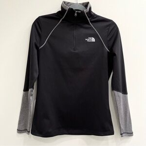 Woman’s North Face fleece lined black gray 1/4 zip pullover size small